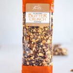 Bag of Buttercrunch almond toffee with orange bands at top and bottom